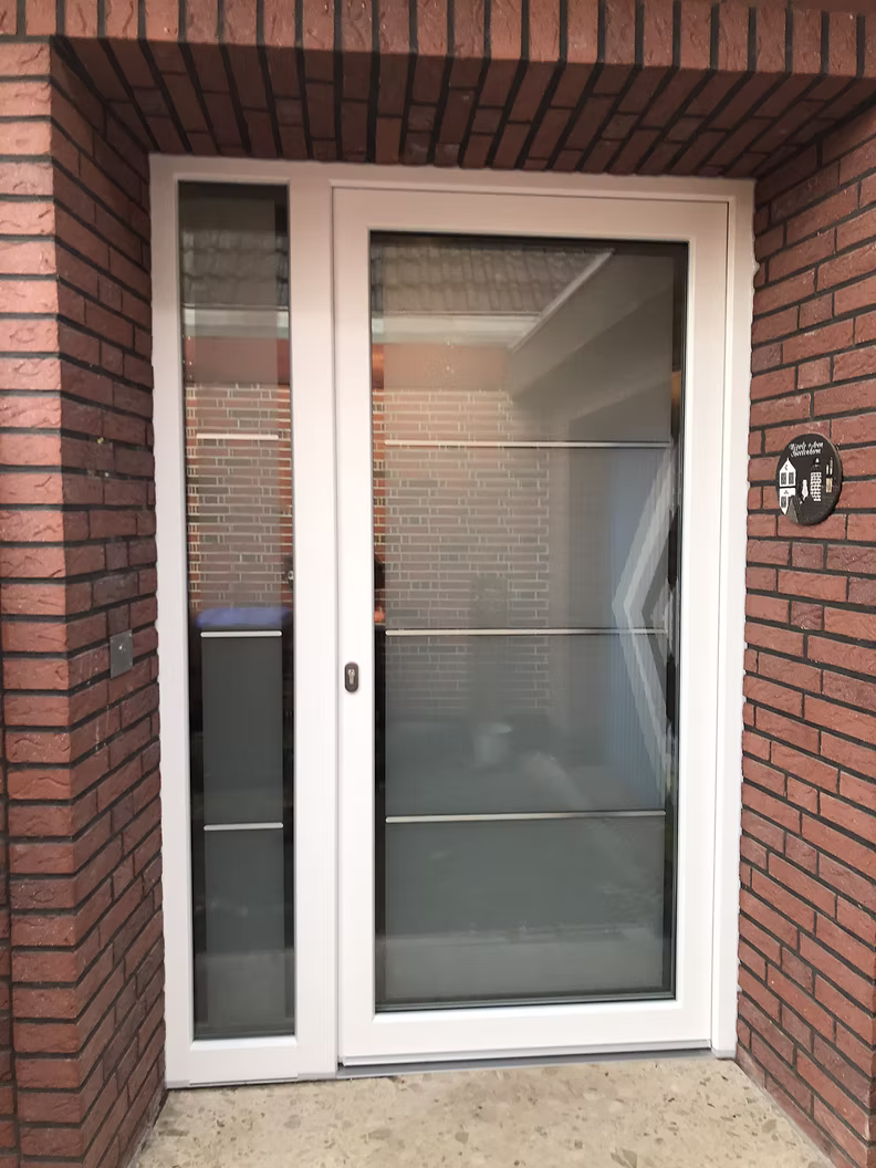 Kunststofffenster in Klinkerfassade